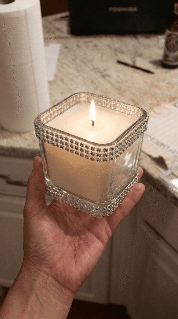 glass candle holder decorated with rhinestones as a DIY