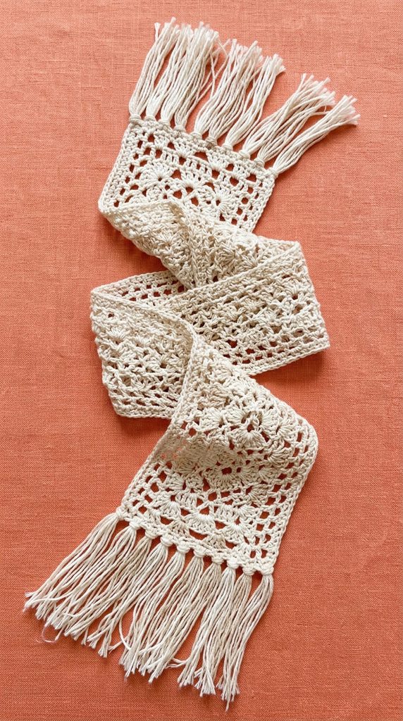 Lightweight crochet scarf with fringe detail