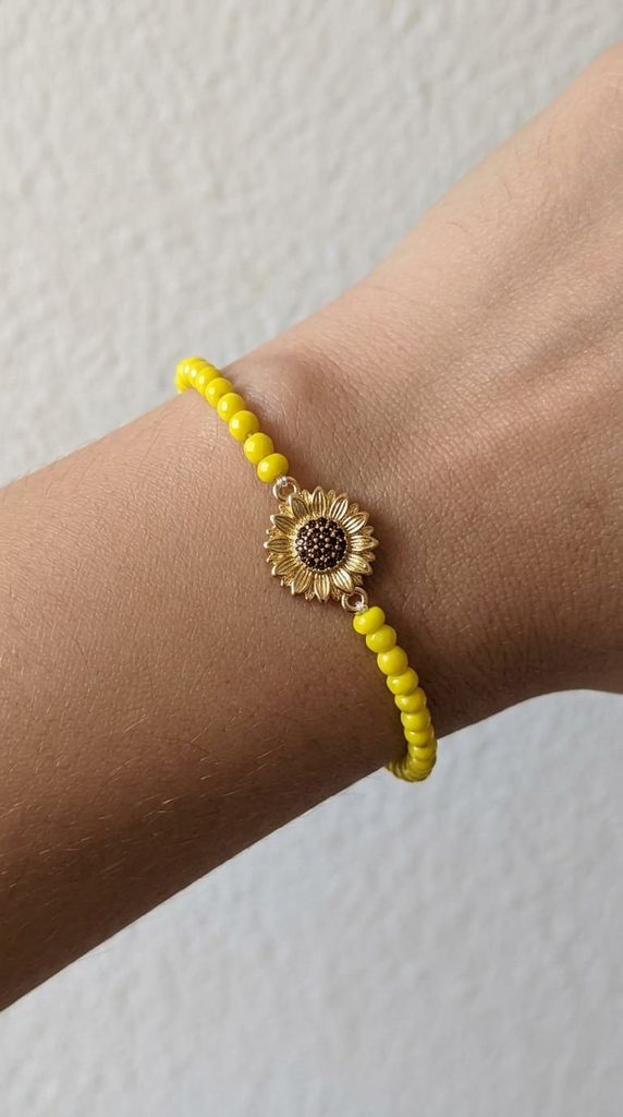 yellow beaded stretch bracelet with sunflower charm