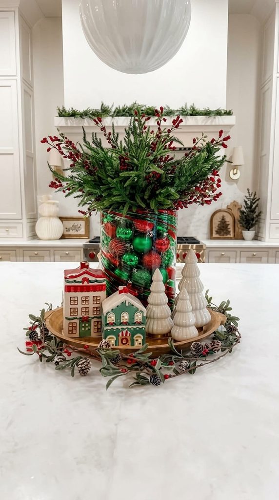 glass cylinder vase filled with Christmas ornaments